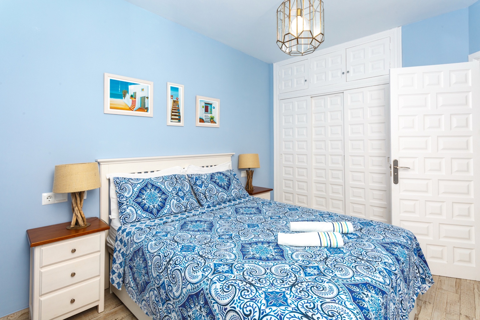 Double bedroom with blue decor