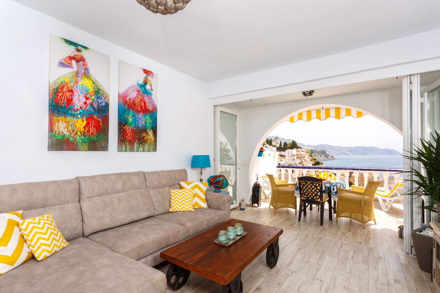 Living area opening directly onto the sea-view terrace