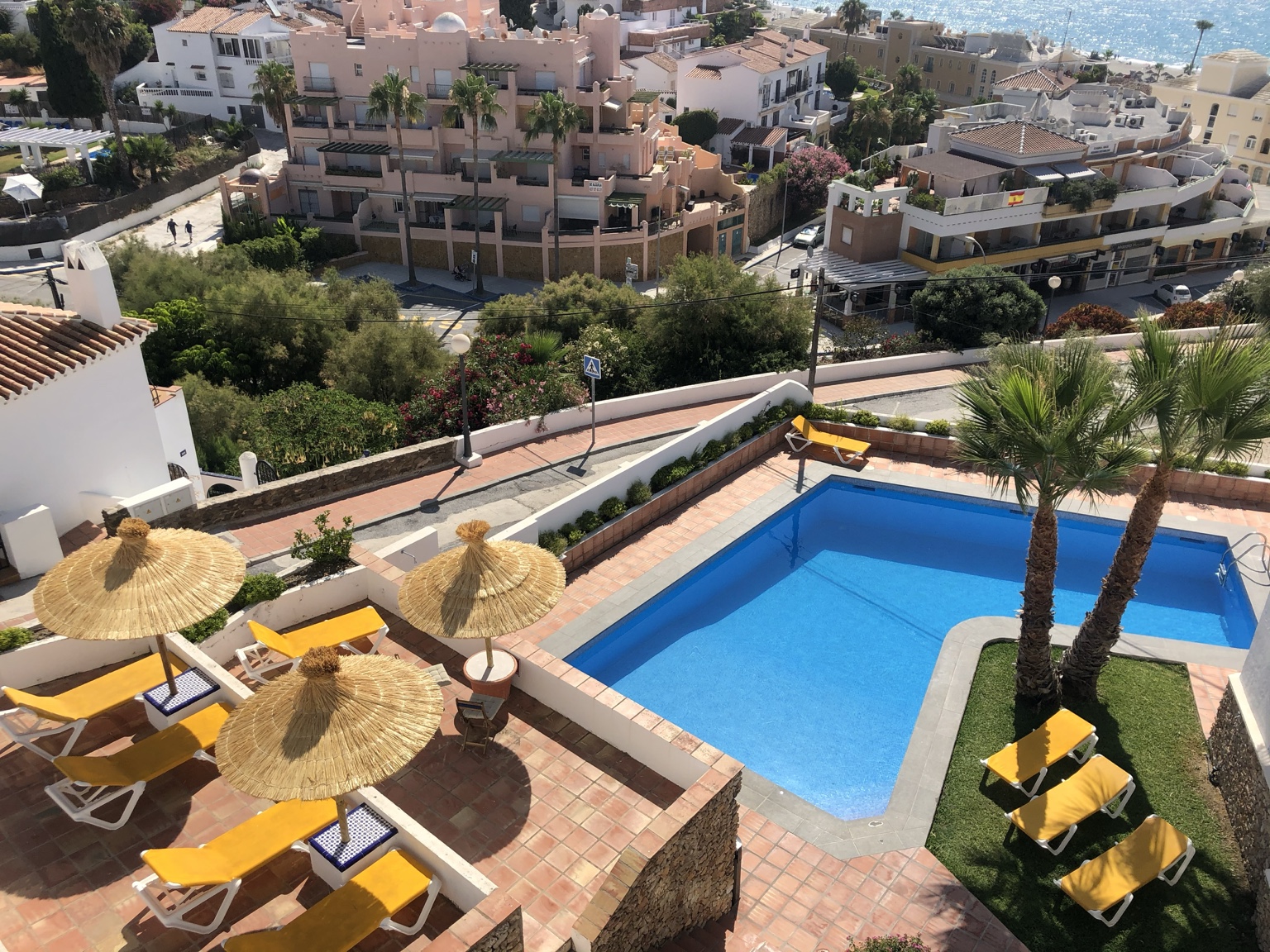 Aerial view of pool and surrounding terrace